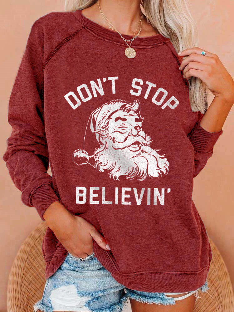 Don't Stop Believing Santa Print Sweatshirt