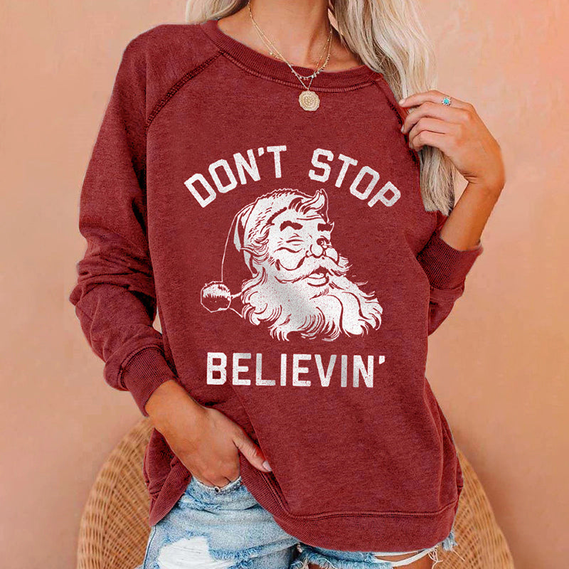 Don't Stop Believing Santa Print Sweatshirt